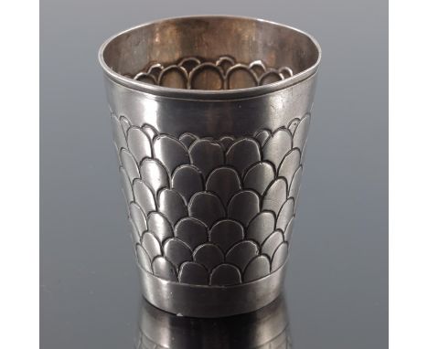 An 18th century German silver beaker, Nuremberg, conical form, incised with fish scale design, 6cm high, 1.74ozt