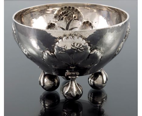 Josef Hoffmann and Josef Husnik for Wiener Werkstatte, a Secessionist silver bowl, planished and embossed with stylised trefo