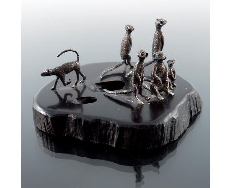 Patrick Mavros, an African Modernist silver and hardwood figure group of a meerkat family, Zimbabwe, signed with seal, 9.5cm 