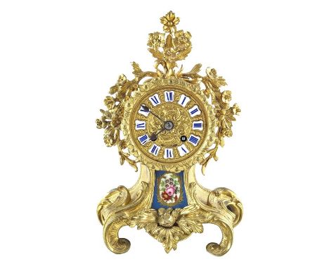 Henri Picard, a French ormolu mantel clock, Pepin a Paris, relief moulded Rococo form with Sevres style plaque painted with f