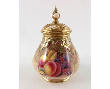 J Reed for Royal Worcester, a fruit painted potpourri vase and cover, lobed footed baluster form, decorated in the round, bel