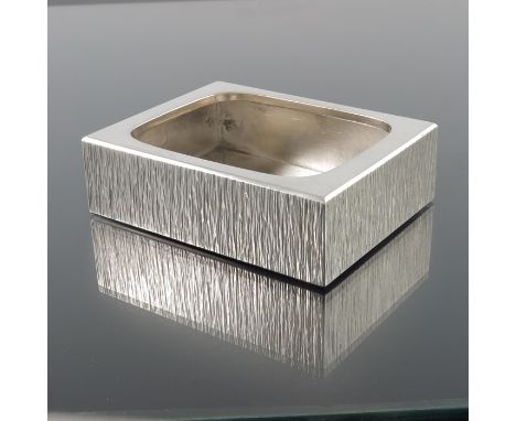 Gerald Benney, a Modernist silver box or tissue holder, London 1972, cuboid form, with rounded opening, bark textured sides, 