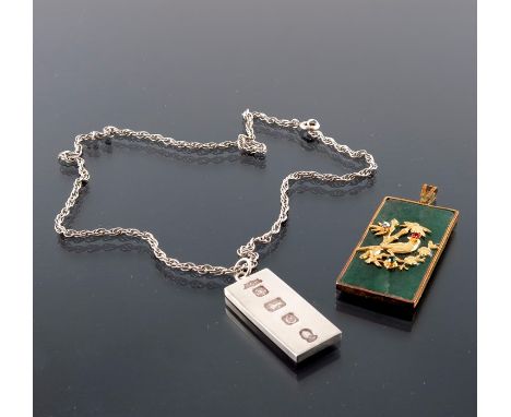 A Chinese jade rectangular pendant, with yellow metal Chinese characters and mount, together with a Elizabeth II silver ingot