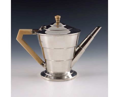 An Art Deco silver teapot, Edward Viner, London 1934, stepped and footed conical form with angled ivory handle and finial, 16