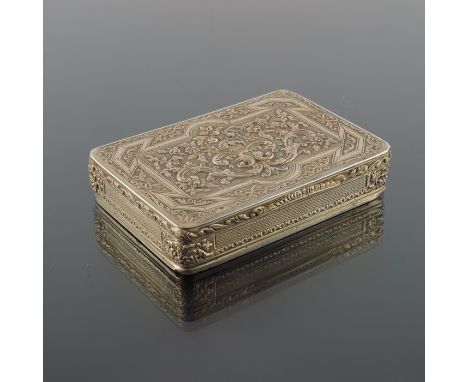 A French silver gilt box, cast and chased with foliate scroll motif within geometric ribbon cartouche, the sides and base wit