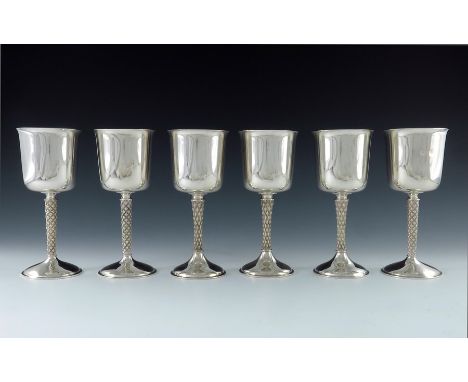 Anthony Elson for Garrard and Co., a matched set of six Modernist silver goblets, London 1973, 1976 and 1978, the beaker shap