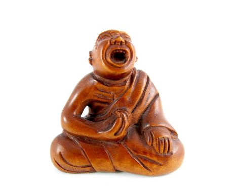 A Japanese carved wood netsuke, Meiji, modelled as a seated blind beggar, signed Gyokuzan, 4.5cm high