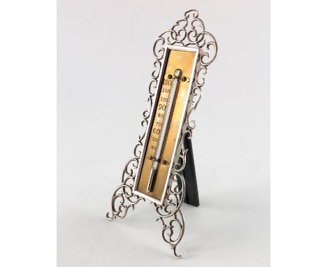 An Edwardian silver framed thermometer, John Tiley, London 1902, reticulated foliate scroll design, easel backed, 23cm high