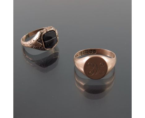 A 9 carat gold signet ring, and another set with hardstone, approx. sizes K and N, 7.7g (2)