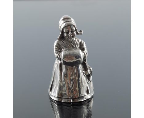 A Continental silver figural bell, modelled as a Dutch girl, pseudo marks, 8.5cm high, 3.02ozt