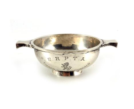 An Elizabeth II Scottish silver quaich, Hamilton and Inches, Edinburgh 1973, conventional twin handled form, 12cm long, 2.67o