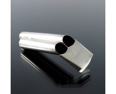 A Victorian silver double whistle, London 1894, with two cylinders of different lengths and an angled mouth piece, 9.5cm long
