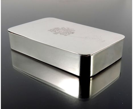 An Art Deco Dutch silver tobacco box, circa 1930, cushioned cuboid form, engraved coats of arms to the lid, inside and out, 1