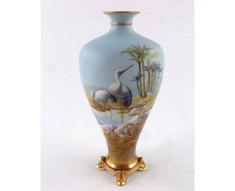 W Powell for Royal Worcester, a stork painted vase, 1911, inverse baluster form, on four dolphin mask feet, decorated with a 