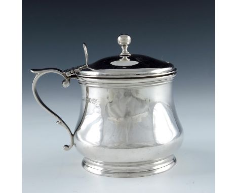 A Victorian silver mustard pot, William Fountain, London 1840, squat baluster form, S scroll handle and domed lid, gilt inter