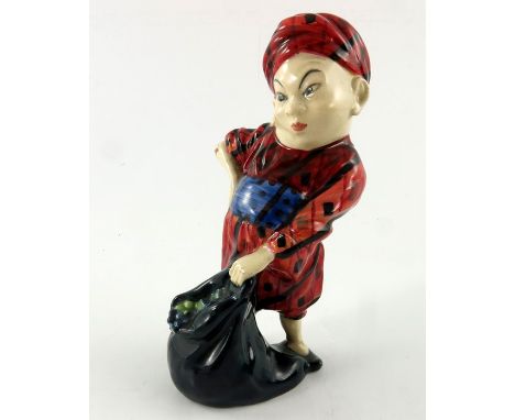A Royal Doulton figure, One Of The Forty , introduced 1921, painted red and orange cloak, blue sash, orange, red and blue tur