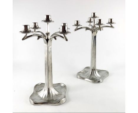 Bitter and Gobbers, Imperial zinn, a pair of Jugendstil pewter five light candelabra, each with four branches from a square s