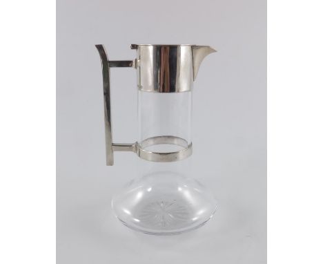 Christopher Dresser for Hukin and Heath, a silver plated and glass claret jug, circa 1880, cylindrical necked bulbous form wi