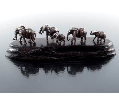 Patrick Mavros, an African Modernist silver and hardwood figure group of an elephant family, Zimbabwe, signed with seal, 16cm