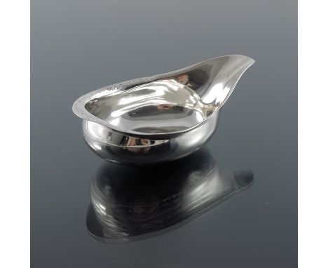 A George III silver pap boat, London 1786, the everted rim with bright cut decoration, 12cm long, 1.88ozt