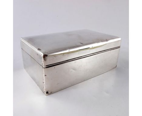 A George V Silver cigarette box, J.B London 1914, 14cm wide