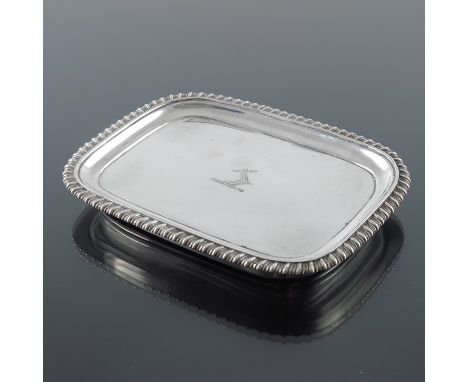 A George III silver coaster tray, Rebecca Eames and Edward Barnard, London 1816, cushioned rectangular form with gadrooned ri