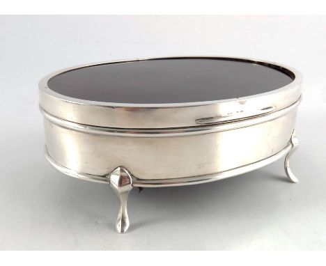 A George VI silver and tortoiseshell effect jewellery box, Mappin and Webb, London 1947, oval form, on four cabriole legs, ve