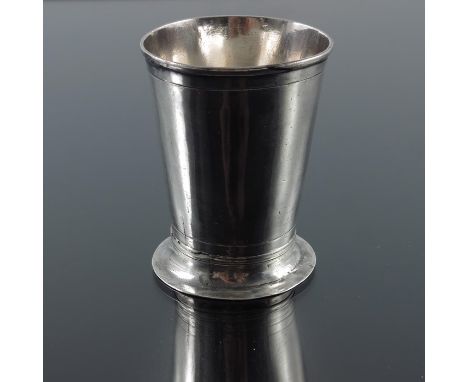 A 17th century Norwegian silver beaker, Bergen circa 1670, conical form with splayed foot, incised rings, 7.5cm high, 2.53ozt