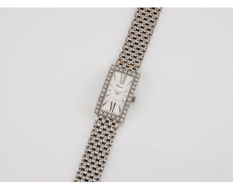 ARMBANDUHR 'CHOPARD' Schweiz, 20. Jh. Weißgold. L. 16,5 cm, Ges.-Gew. ca. 71 g. Gest. 750. Hochrechteckiges Gehäuse in leicht