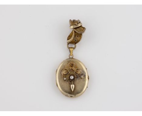 MEDAILLON-ANHÄNGER Gelbgold. Ges.-L- 6 cm, Ges.-Gew. ca. 9,9 g. Medaillonkorpus und Gürtel-Öse geprüft 14 K. Medaillon mit Me