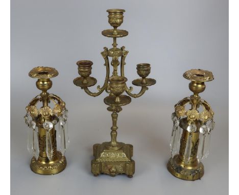 Pair of gilt candlesticks &amp; large candlestick