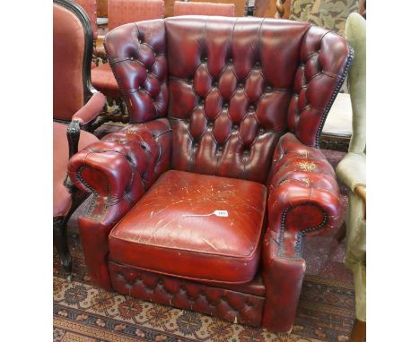 Leather button back armchair