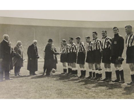 A specially commissioned album relating to the Newcastle and Arsenal F.A. cup final 1932, including large photographs, team p