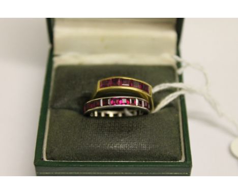 An 18ct gold five stone ruby ring, together with a white gold ruby eternity ring. (2)