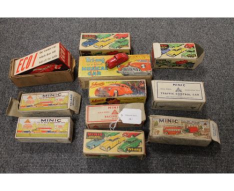 A collection of nine early Minic vehicles, together with a Tri-ang musical car, Schuco Magic Auto 2008 and an Eco1 Wonder car