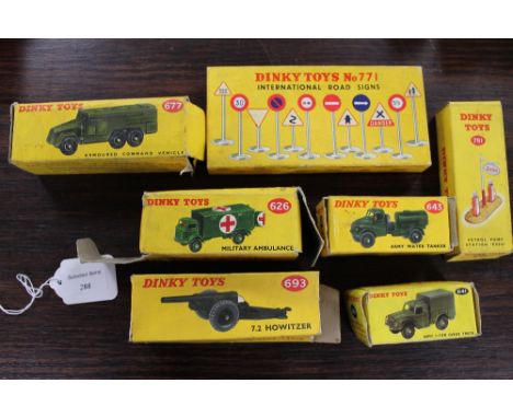 A Dinky Toys No.771 International Road Sign set, together with Petrol pump 781 and five military vehicles, all parts boxed. (