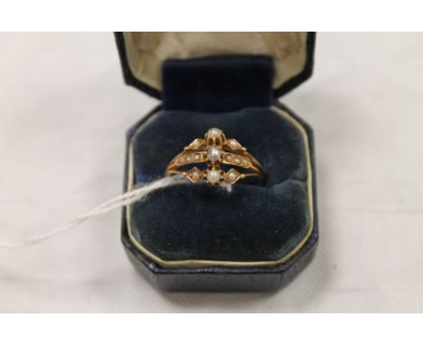 A Victorian seed pearl ring. CONDITION REPORT: Good condition, the yellow metal shank un-marked.
