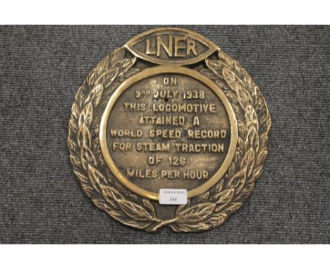 A brass LNER 'Mallard' plate, diameter 29 cm. CONDITION REPORT: A reproduction item in good condition.