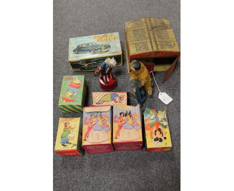 A Mettoy tin plated Joy Town Fire Brigade station, together with a collection of nine mechanical and other toys, part boxed. 