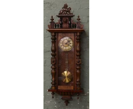 A walnut cased Kienzle Vienna regulator wall clock with 8 day movement enamel and brass dial chiming on a coiled gong with pe