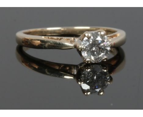 A 9ct gold solitaire diamond ring 0.5ct, size M. Condition Report. To be used as a guide only. Visible inclusions.