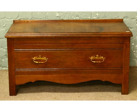 An upcycled oak bench with integrated drawer.