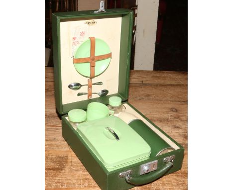 A green vinyl cased picnic set by Sirram made in England.
