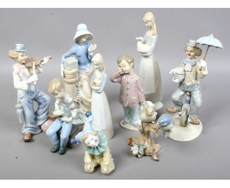 Nine glazed ceramic figurines to include Nao and Leonardo examples.