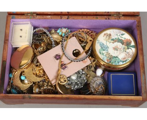 A box of costume jewellery brooches, pendants, rings, chains etc.