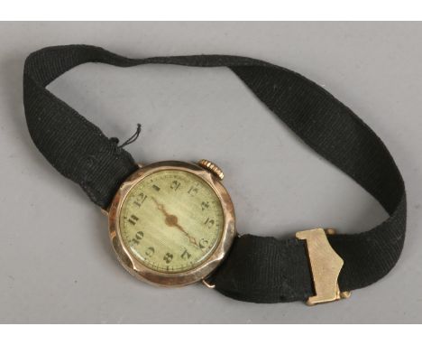 A 9ct gold manual watch. (in need of attention)
