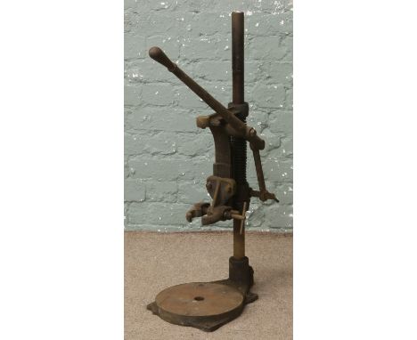 A vintage Black and Decker bench drill stand.