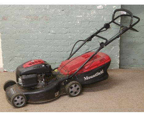 A Mountfield 160cc self propelled petrol rotary lawn mower, electric and manual start, for repair. Condition Report. To be us