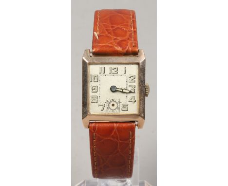 A gentlemans c1930s 9ct gold cased manual Tank watch with square satin dial. Condition Report. To be used as a guide only. Ru