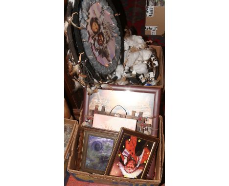 Two boxes of Native American dream catcher pictures and a wall clock.